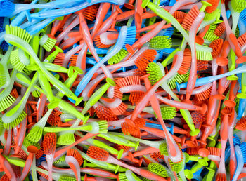 Full frame shot of toilet brushes for sale at market stall