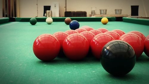 Close-up of snooker balls on table