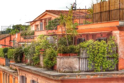 View of residential building with trees in background