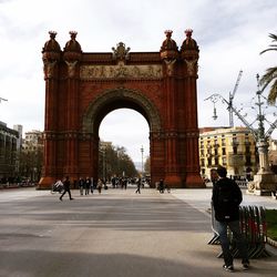 People in front of historical building