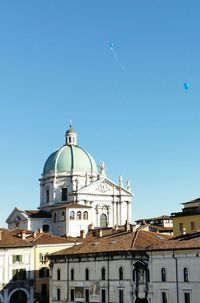 Low angle view of church against clear blue sky