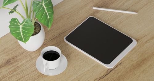 High angle view of coffee cup on table