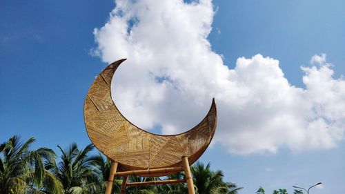 Low angle view of statue against sky