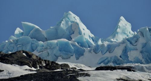 Snowcapped mountains against sky