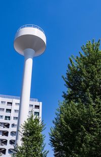 Low angle view of tower against clear blue sky