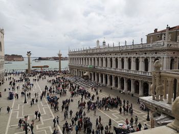 Group of people in front of historical building