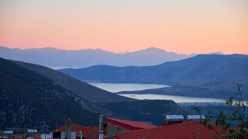 Scenic view of gulf of corinth and mountains against sky