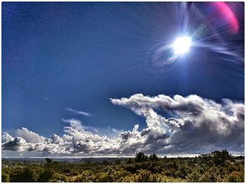 Sun shining through clouds