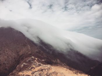 Scenic view of volcanic landscape against sky