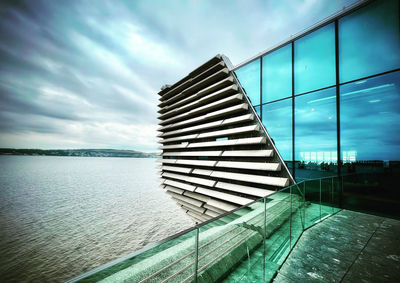 Low angle view of building against sky during sunset