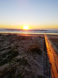 Scenic view of sea at sunset