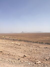 Scenic view of desert against clear sky