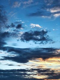 Low angle view of clouds in sky during sunset