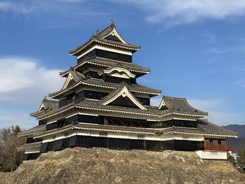 Low angle view of matsumoto castle against sky