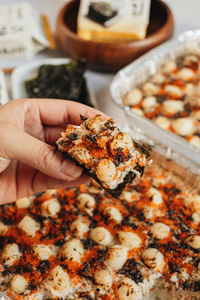 Close-up of hand holding bread