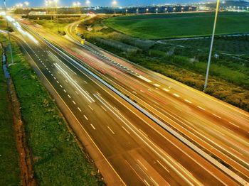 High angle view of light trails on street in city