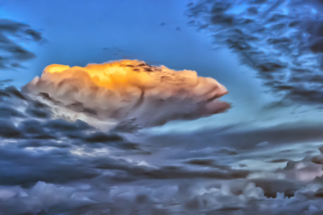 cloud, sky, nature, wave, reflection, no people, water, sunlight, motion, sea, beauty in nature, environment, outdoors, snow, macro photography, blue, scenics - nature, dramatic sky