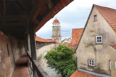 Low angle view of bell tower against sky