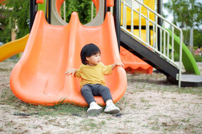 Portrait of boy playing in park