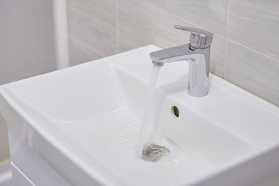 High angle view of faucet in bathroom