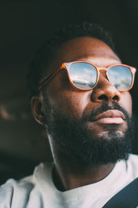 Close-up of man wearing eyeglasses