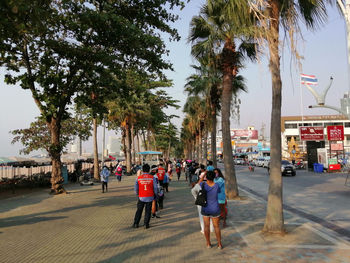 Group of people walking on street