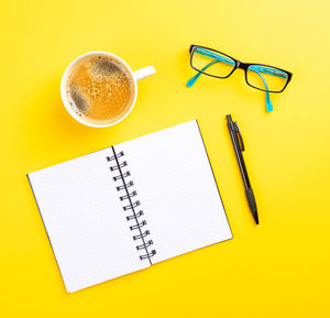 Directly above shot of coffee cup on table