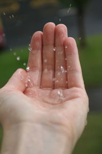 Close-up of wet hand