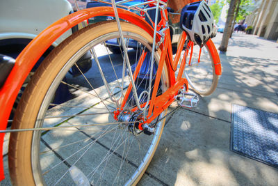 Close-up of bicycle on street