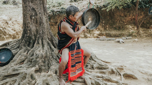 Side view of man standing on beach