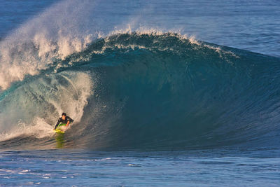 Man surfing in sea