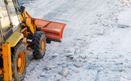 Bulldozer on snow