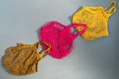 Three reusable cotton net bags or mesh bags. caring for the environment and the rejection of plastic