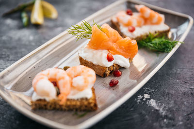 Close-up of sushi in plate on table