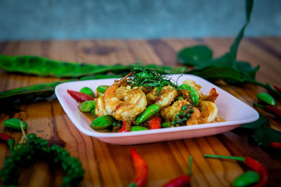 High angle view of salad in plate on table