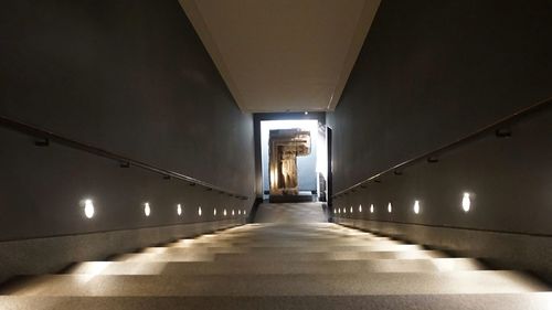 Man in illuminated corridor