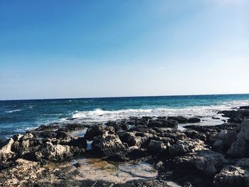 Scenic view of sea against clear sky