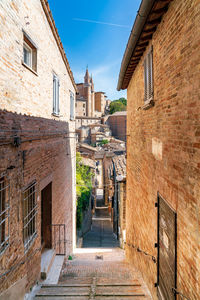 Alley amidst buildings in town