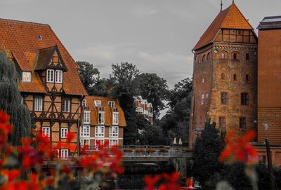 Buildings in city against sky