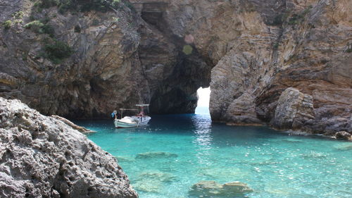 Scenic view of sea against mountain