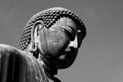 Close-up of statue against clear sky