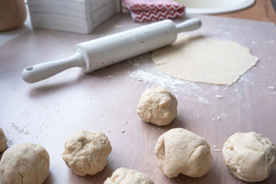 Close-up of rolling pin on table