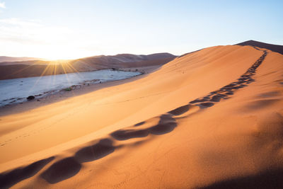 Scenic view of desert against sky