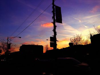 Silhouette of building at sunset