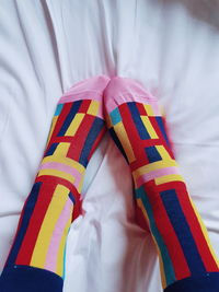 Low section of child on bed