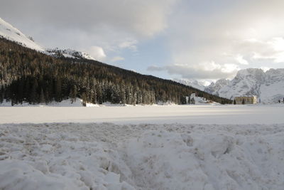 Scenic view of snowcapped mountains against sky