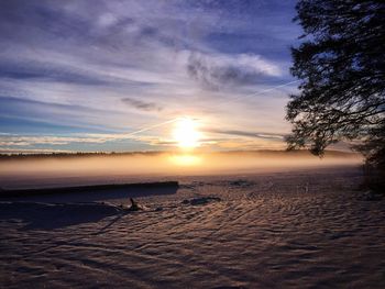 Scenic view of sunset over river