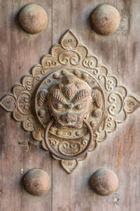 Close-up of old door knocker