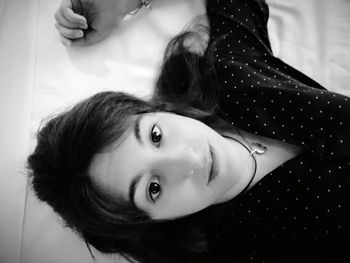 Portrait of smiling woman at home