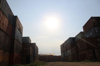 Low angle view of buildings against sky during sunset